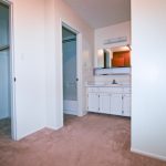 Sherwood & Forest Arms Apartments bathroom with double sinks and large walkin closet