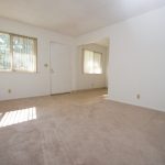 Cascade Apartments living area showing front door and window