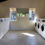 Alvarado Parkside apartments laundry room community area